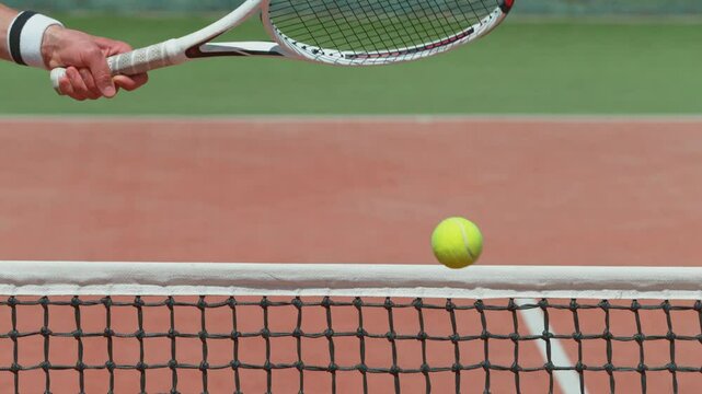 Super slow motion shot of tennis ball hitting the net . Filmed on high speed cinematic camera at 1000 fps.