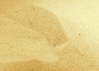 Sand texture. Sandy beach for background. Top view. Sand Texture. Golden sand. Background from fine sand.
