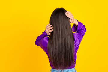 Fototapeta premium Photo of lady stand back rear view spine touch brunette hair isolated bright color background