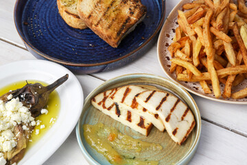 Various Mediterranean dishes served on the restaurant table