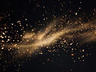 Golden glitter sparkles on black background