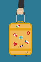 Tourist hand holds luggage. Time to travel. Retro cartoon suitcase with flag labels and icons. Traveller with suitcase. Vacation, tourism concept. Vertical banner.