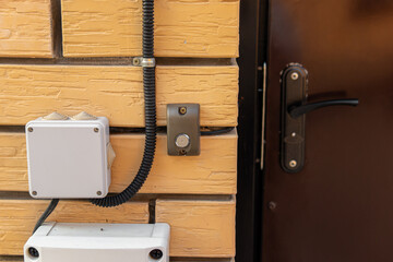 Door with magnetic lock. Exit button. Gate with magnetic lock
