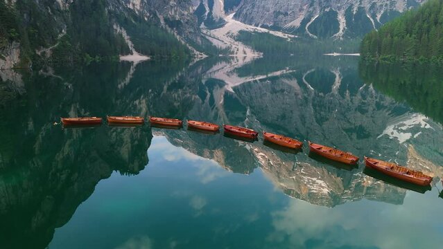 Italy dolomites natural park braies lake surroundings boats and general images 4k with drone