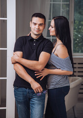 Naklejka premium Couple Posing For Portrait Inside