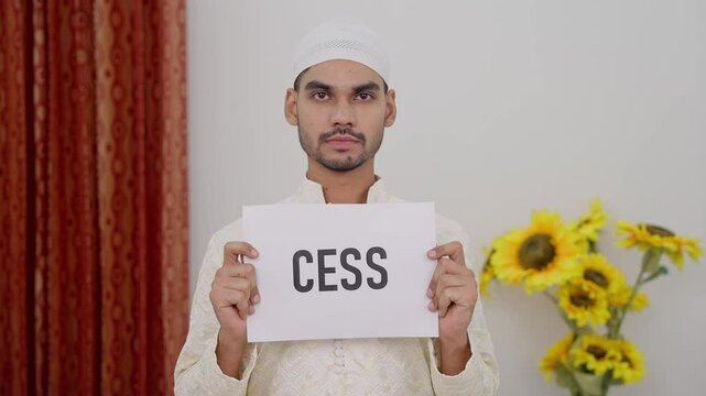 Muslim Man Holding CESS Poster