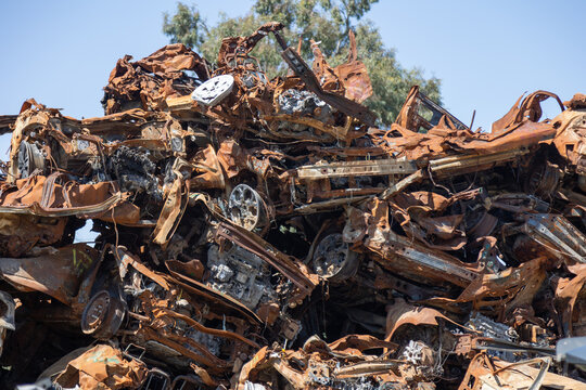 Sa'ad, Israel – May 9 2024, Cars remaining, burned cars after the attack on October 7th by Hamas. The cars were collected on the farmer's field and serves now as an attacks memorial and a remainder.