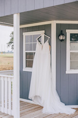 wedding dress hanging on a bride hanger
