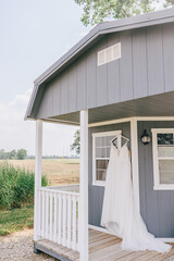 wedding dress hanging on a bride hanger
