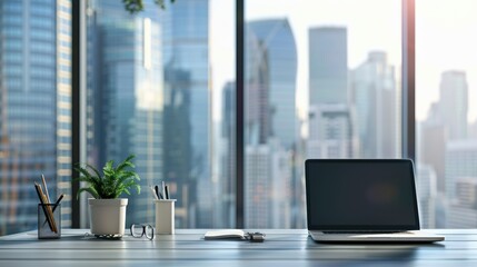 Fototapeta premium Modern office desk with laptop and city view in the morning