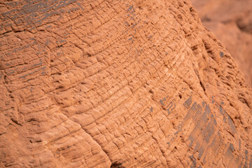 A rock wall with a lot of cracks and crevices