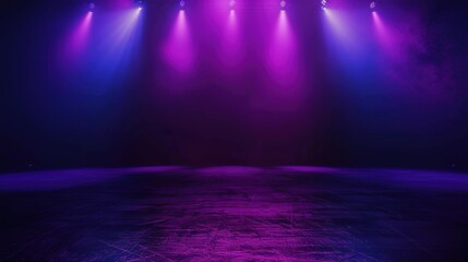 Obraz premium Purple and blue stage lights on dark background