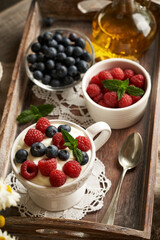 Cottage cheese with flax seed oil, raspberries and blueberries. Budwig diet.