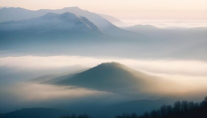 Obraz premium mountain layers and sunrise view in cold and foggy weather.