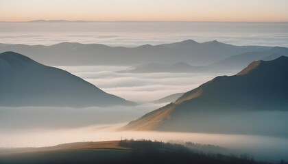 Fototapeta premium mountain layers and sunrise view in cold and foggy weather.