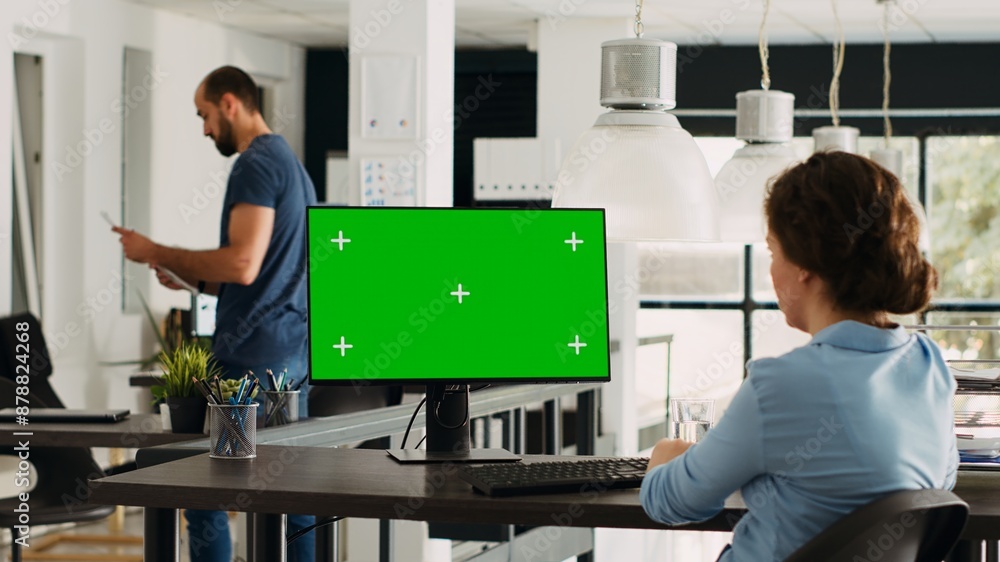 Poster operator of enterprise relying on chromakey isolated greenscreen display. company executive using co