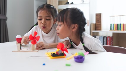 STEM education concept. Asian students learn at home with STEM toys, mathematics engineering science technology computer code in robotics for kids' concepts.