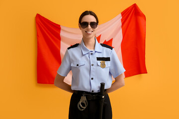 Female police officer and flag of Canada on yellow background