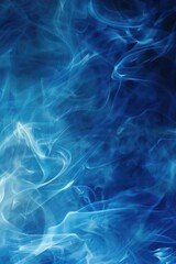 Fototapeta premium Close-up shot of blue smoke on a dark background, ideal for use in designs related to mystery, technology or creative concepts
