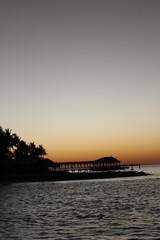 Island jutting at sunset