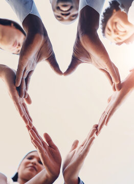 Heart, teamwork and hands of business people in support, unity or collaboration for diversity. Mockup, emoji and group of employees with love shape for trust, care and solidarity for company hope.
