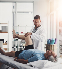 Physiotherapy, leg pain and man with senior patient for orthopedic care, consulting and wellness....
