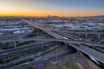 Interstate Freeway junction and rush hour traffic at sunrise. Maryvale, Phoenix, Arizona, United...