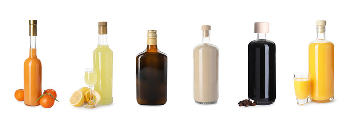 Collection of different tasty liqueurs on white background
