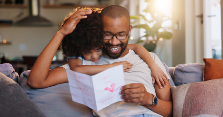 Card, hug and dad with child in home for fathers day celebration with bonding together. Happy, love and black man embracing boy kid with care for drawing gift on sofa in living room at family house.