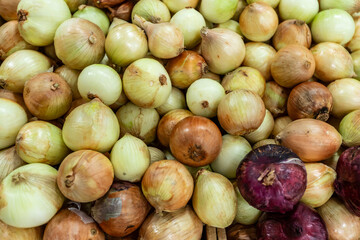 Pile of  onion to sale at open air market.