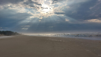 Stormy sky over the  Sea. The sun's rays make their way through the clouds.