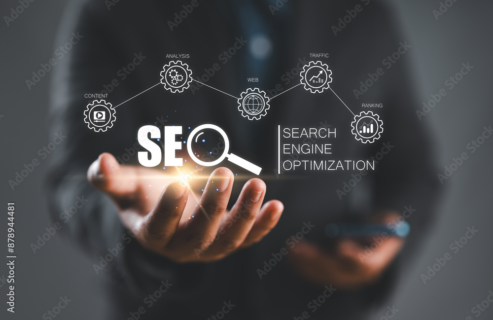 Poster Businessman hold virtual SEO icon to analyze SEO search engine optimization for promoting ranking traffic on website and optimizing your website to rank in search engines.