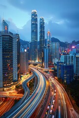 Fototapeta premium A dynamic cityscape featuring towering skyscrapers and vibrant light trails from traffic, captured at dusk in a modern urban environment.