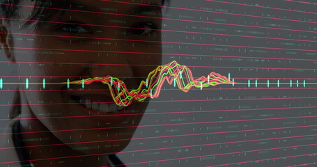 Image of financial graphs over happy biracial female doctor looking at camera