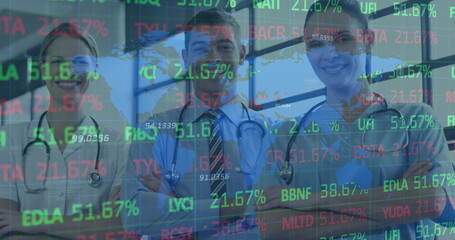 Fototapeta premium Stock market data processing over portrait of diverse doctors and health workers smiling at hospital