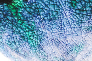 Texture of azure broken glass, close-up