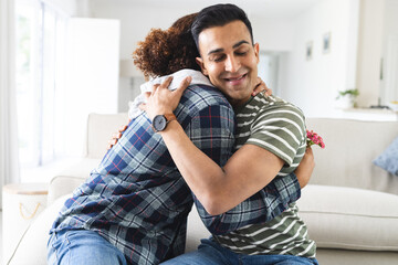 Biracial man surprises his partner at home