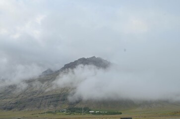 Stunning mountain view with rings of smoke fog mist in Iceland, jokulsarlon