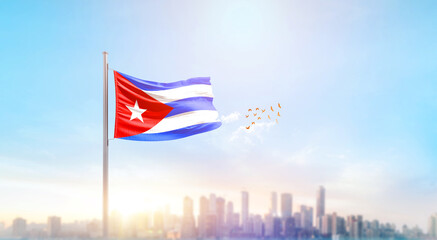 Cuba national flag waving with skyline and buildings. A beautiful view of flag with skyline.