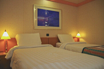 Standard interior category cabin stateroom onboard modern cruiseship cruise ship liner in clean modern design