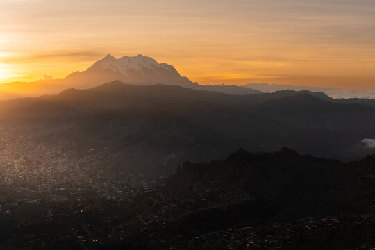 Illimani with the city of La Paz in Bolivia during the golden hour