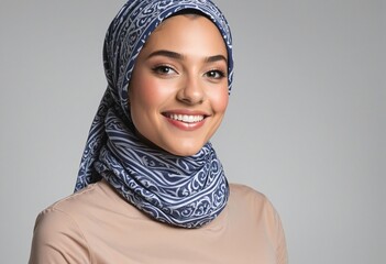 smiling beautiful young woman with head scarf or Muslim hijab, portrait