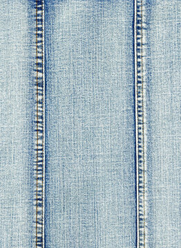 Stone washed denim skirt fabric seam stitching detail background