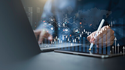 Business finance and investment concept. Businessman analyzing market data or financial graph...