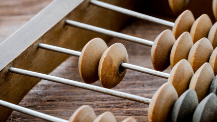 Abacus or abacus on wooden background