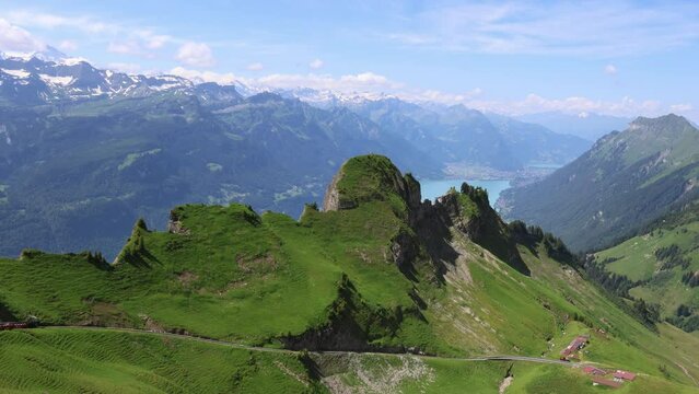 Stunning mountain panorama, view from Brienzer Rothorn with Swiss Alps and lake Brienz