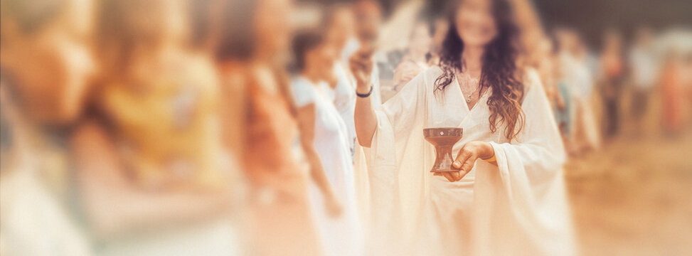 Goddesses in ethereal dresses gather for a mystical ceremony outdoor, holding a chalice. Priestess with incense in her hand at a ceremony, ceremony space.