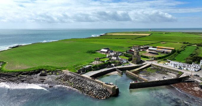 Ireland Epic locations the little pretty fishing harbour of Sladewith Hook Lighthouse and Slade Castle in the harbour,beauty spot in Wexford