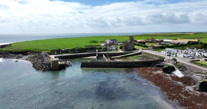 Ireland Epic locations Landscape drone footage of Slade Harbour with Hook Lighthouse in the background Wexford holiday location