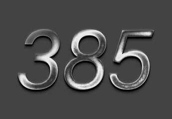Chrome metal 3D number design of 385 on grey background.	